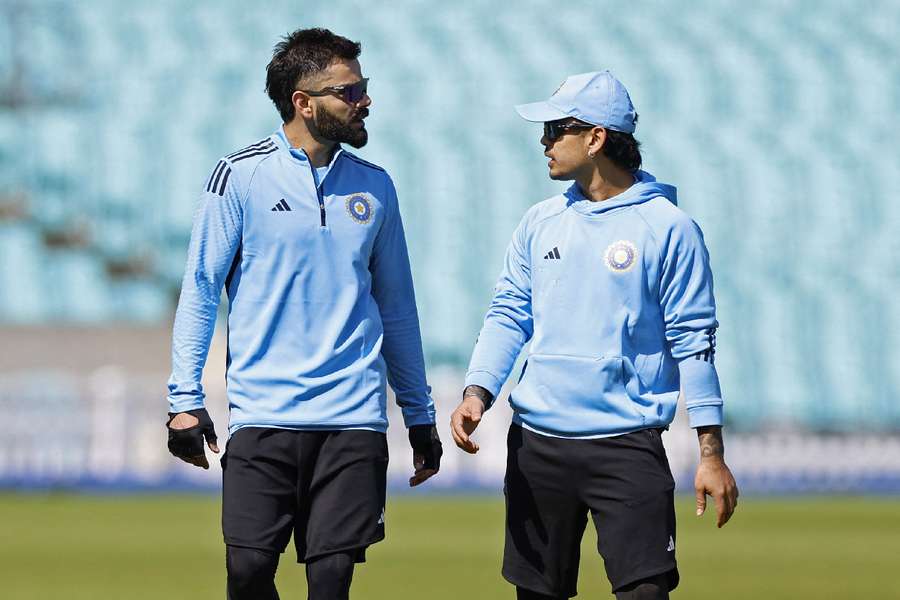 India's Virat Kohli with Ishan Kishan during practice 