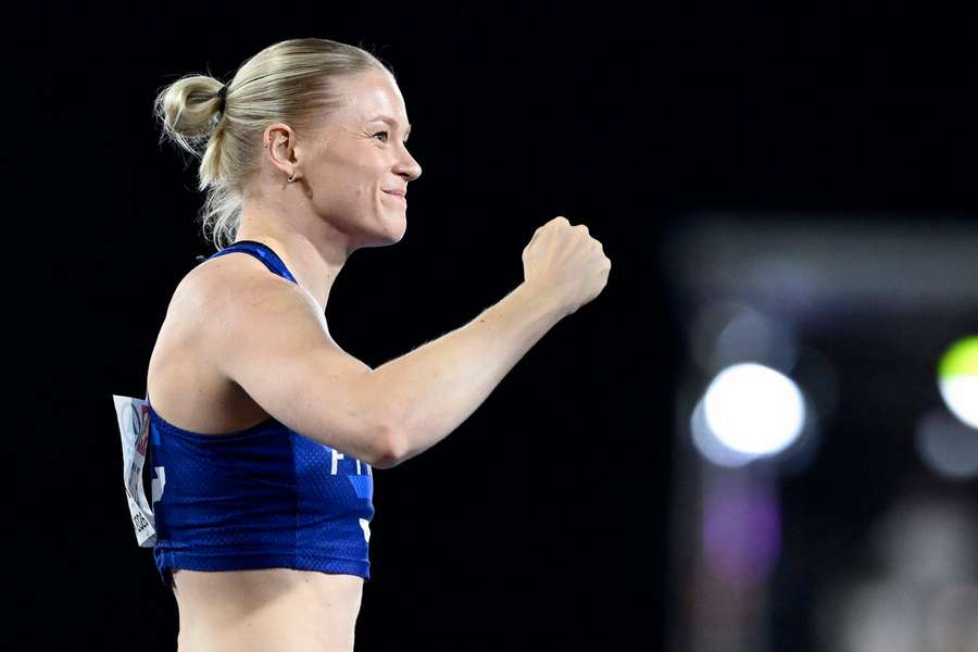 Heltela punches the air after clearing 4.70m