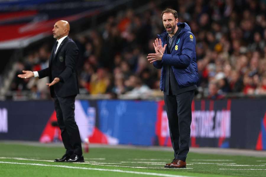 England manager Gareth Southgate (R)