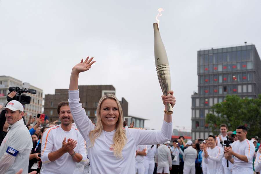Former US skier Lindsey Vonn during the Olympic Village Torch Relay