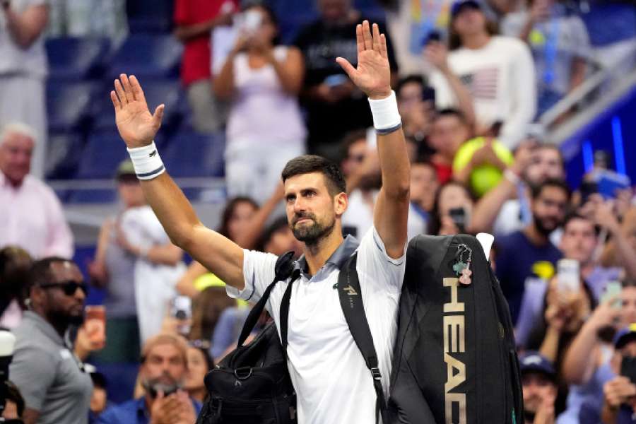 Novak Djokovic celebrates win Novak Djokovic celebrates win