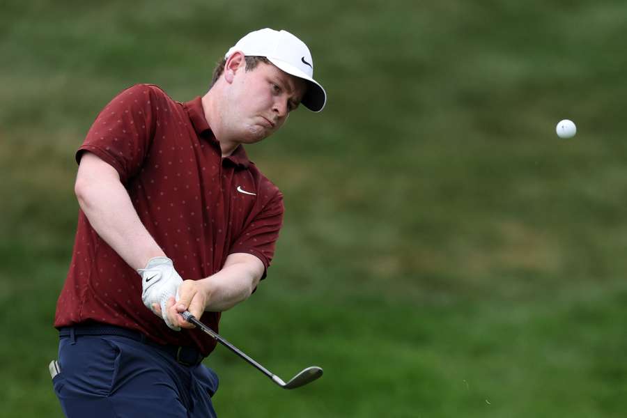 Robert MacIntyre plays a shot on the second hole in the first round on Thursday