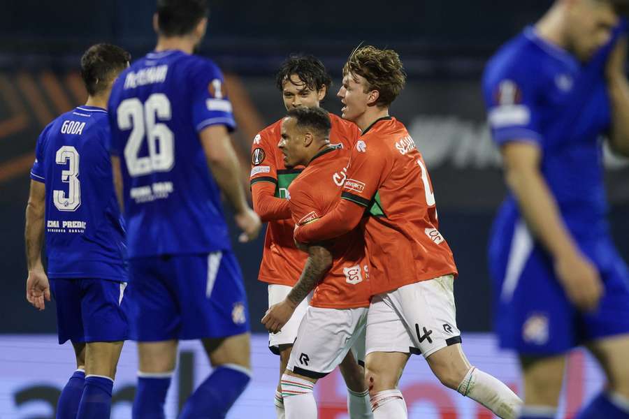 NEC celebrate Tjaronn Chery's goal against Dinamo Zagreb