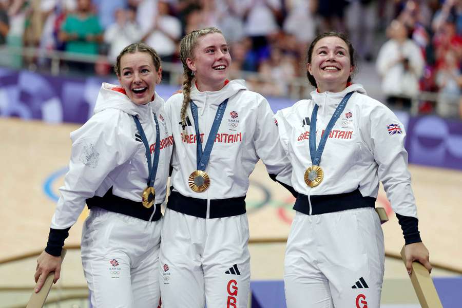 Gold medalists Katy Marchant, Sophie Capewell and Emma Finucane of Team Great Britain celebrate