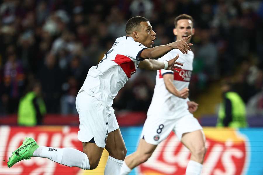Kylian Mbappe celebrates his first of the night in Spain