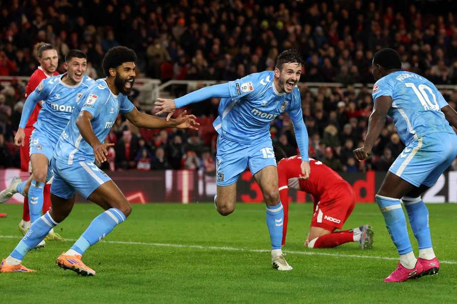 Liam Kitching celebrates after scoring to put Coventry 3-2 up Liam Kitching celebrates after scoring to put Coventry 3-2 up