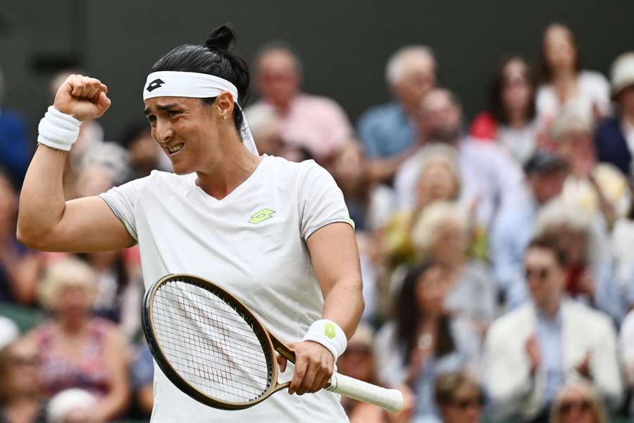 Ons Jabeur celebrates winning a point against Marketa Vondrousova