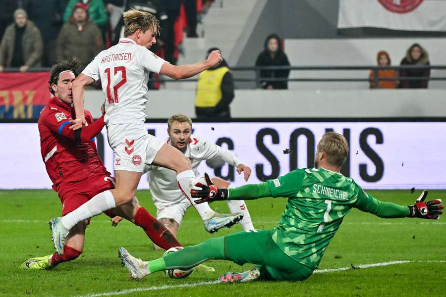 Denmark's Victor Kristiansen fights for the ball with Serbia's forward Dusan Vlahovic