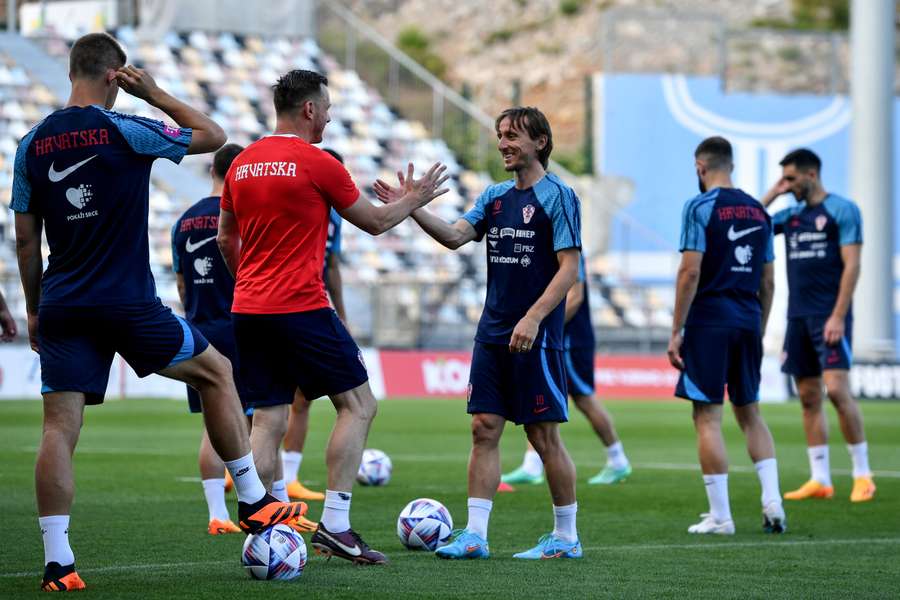 Croatian football players greet each other during a training session ahead of their Nations League semi-final