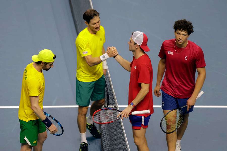 Australia's Jordan Thompson and Matthew Ebden shake hands with Ben Shelton and Tommy Paul