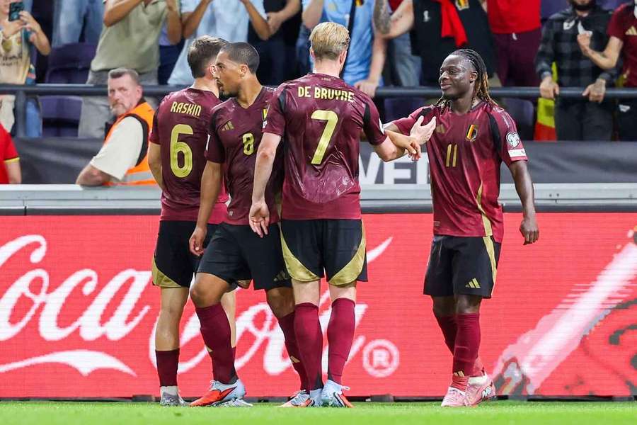 Belgium's Jeremy Doku and Belgium's Kevin De Bruyne celebrate after scoring 