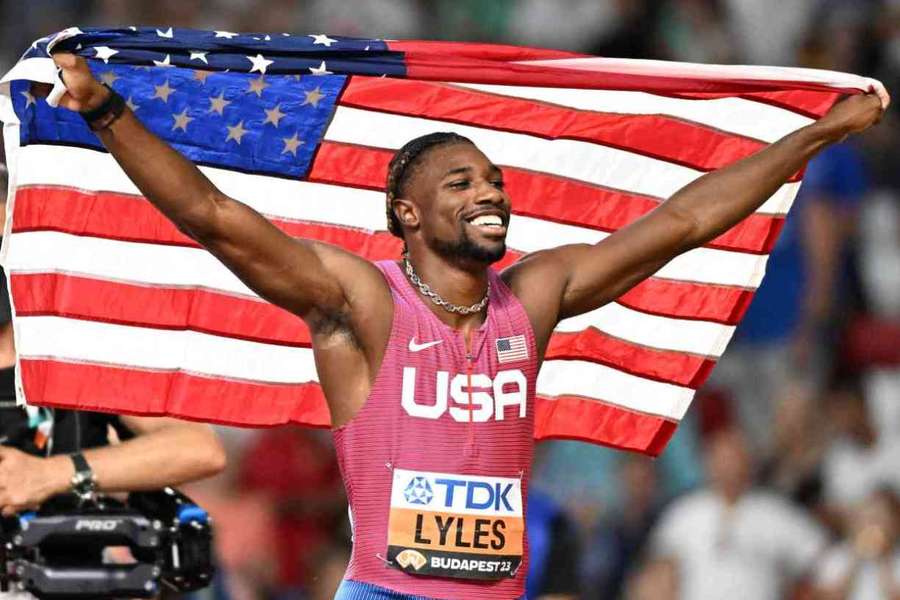 Noah Lyles celebrates after winning the 200m and securing the sprint double for the first time since Usain Bolt in 2015