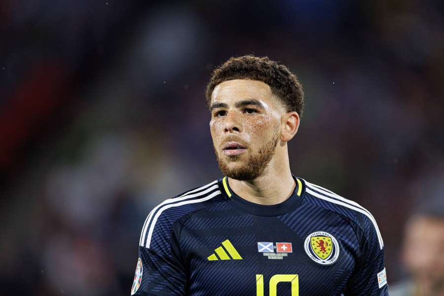 Adams in action for Scotland at the European Championship