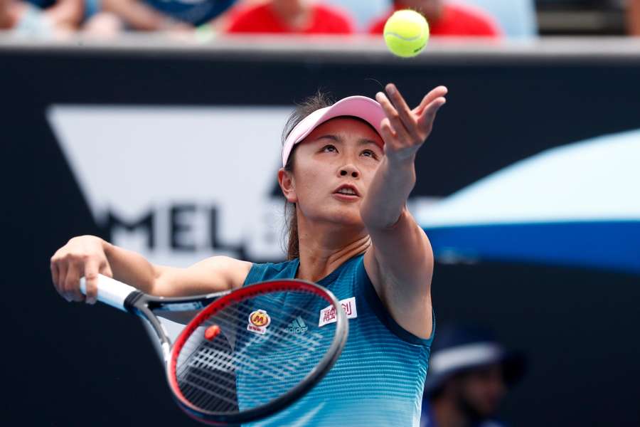 China’s Peng Shuai serves during the match against Canada’s Eugenie Bouchard