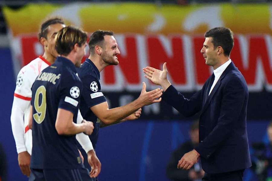 Motta celebrates with his players