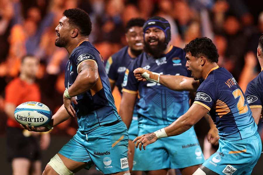 Moana Pasifika captain Ardie Savea and teammates celebrate their weekend victory over Auckland Blues.