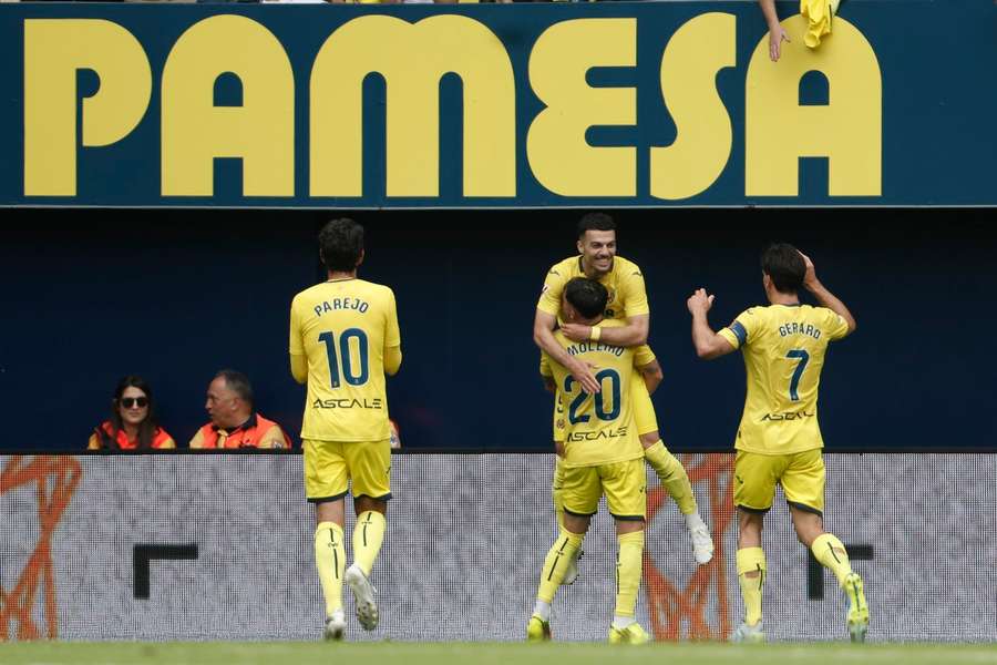 Villarreal's Georges Mikautadze celebrates with teammates