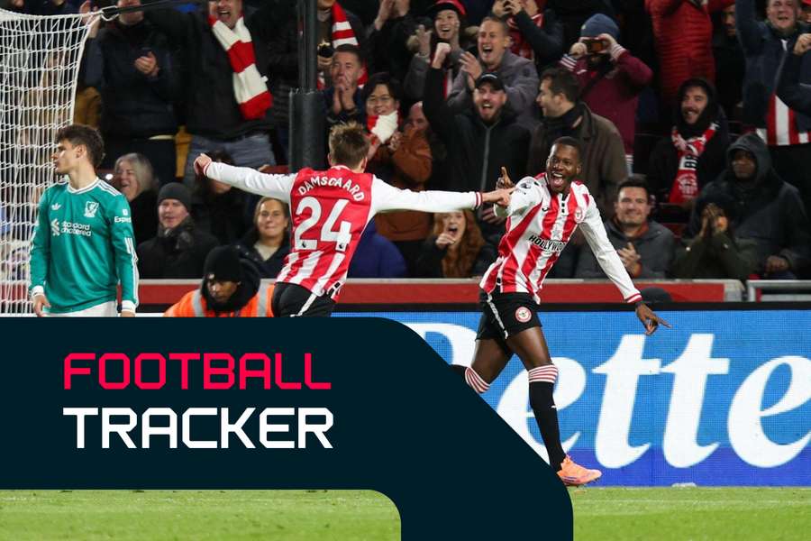 Brentford players celebrate shock lead Brentford players celebrate shock lead