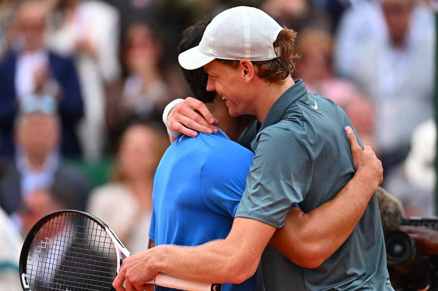 Alcaraz and Sinner share a warm embrace after the match
