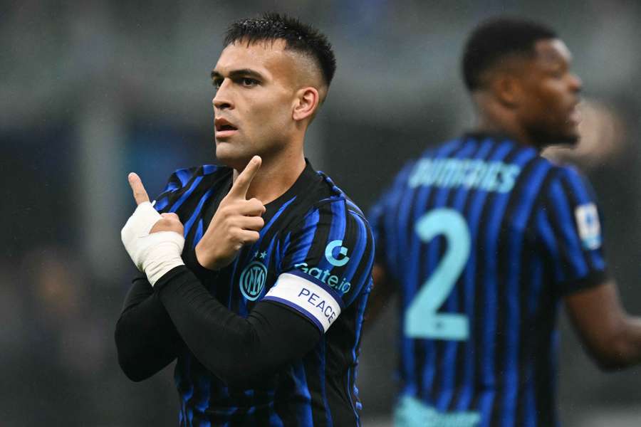 Inter Milan's Lautaro Martinez celebrates after scoring the opening goal against Cremonese