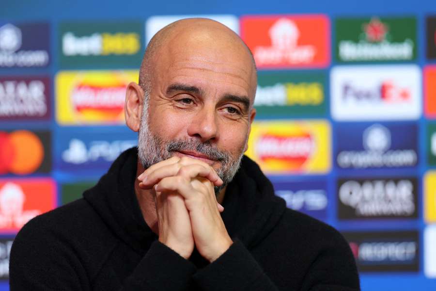 Manchester City manager Pep Guardiola reacts during a Champions League press conference