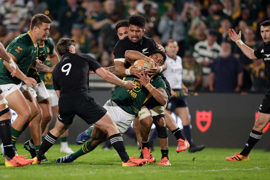 It was a bruising battle of big hits at Ellis Park as the All Blacks stunned their hosts