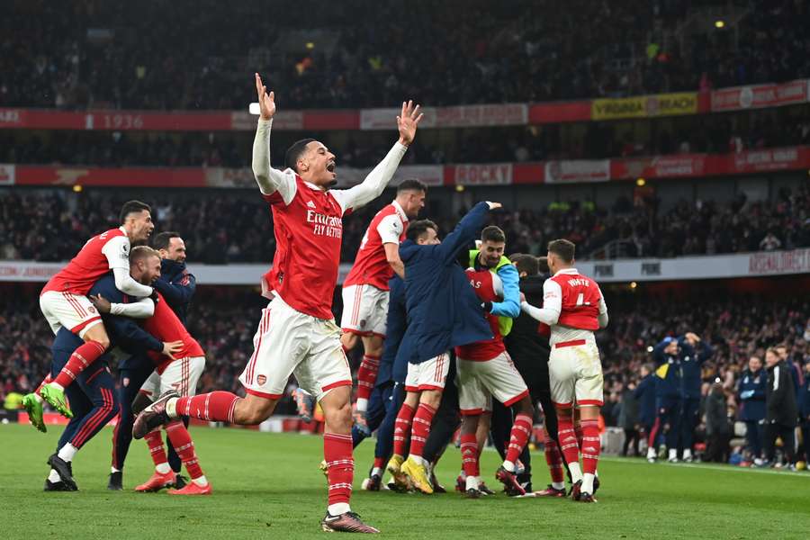 Arsenal celebrate their third goal against Bournemouth