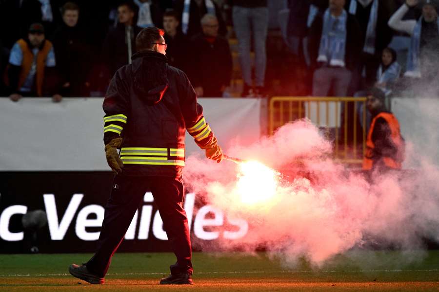 Malmo v Union Berlin interrupted after fans throw fireworks