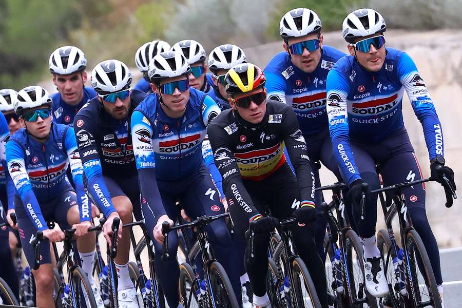 Soudal Quick-Step's Remco Evenepoel (C) and teammates take part in a training ride in Spain