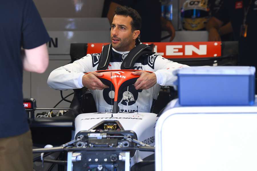 Daniel Ricciardo sits in his car at the Hungaroring race track in Mogyorod near Budapest
