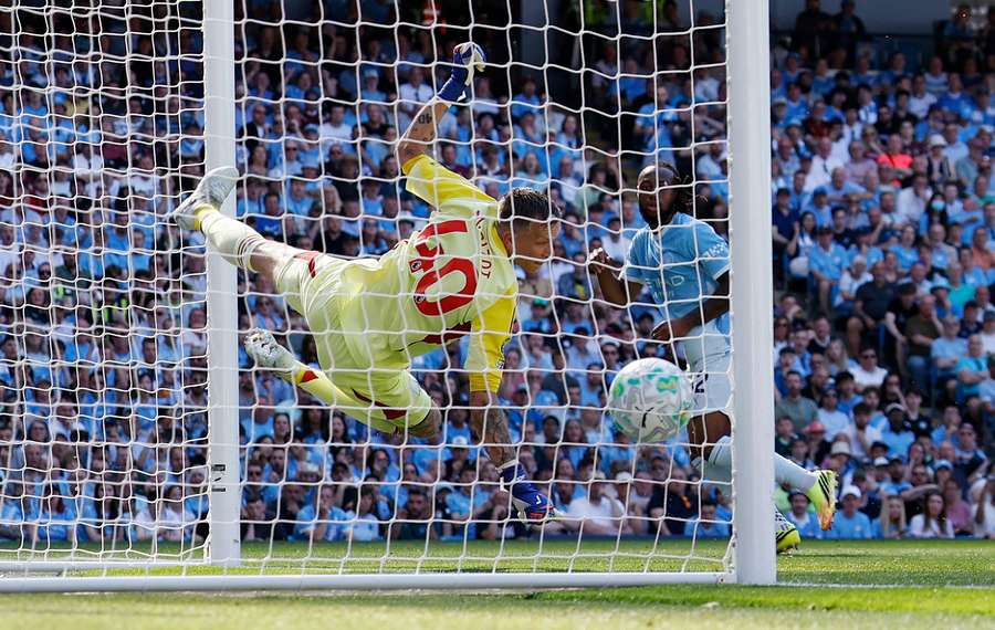 Manchester City's Antoine Semenyo scores their first goal