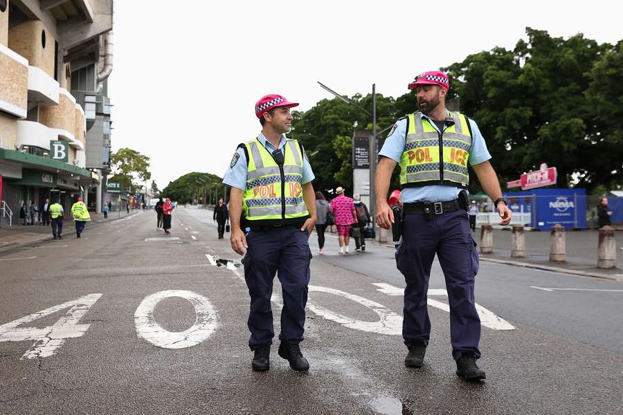 Police offers patrol the SCG in commemorative pink hats on Jane McGrath Day.