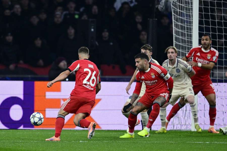 Benfica's Samuel Dahl (#26) lines up to score against Ajax