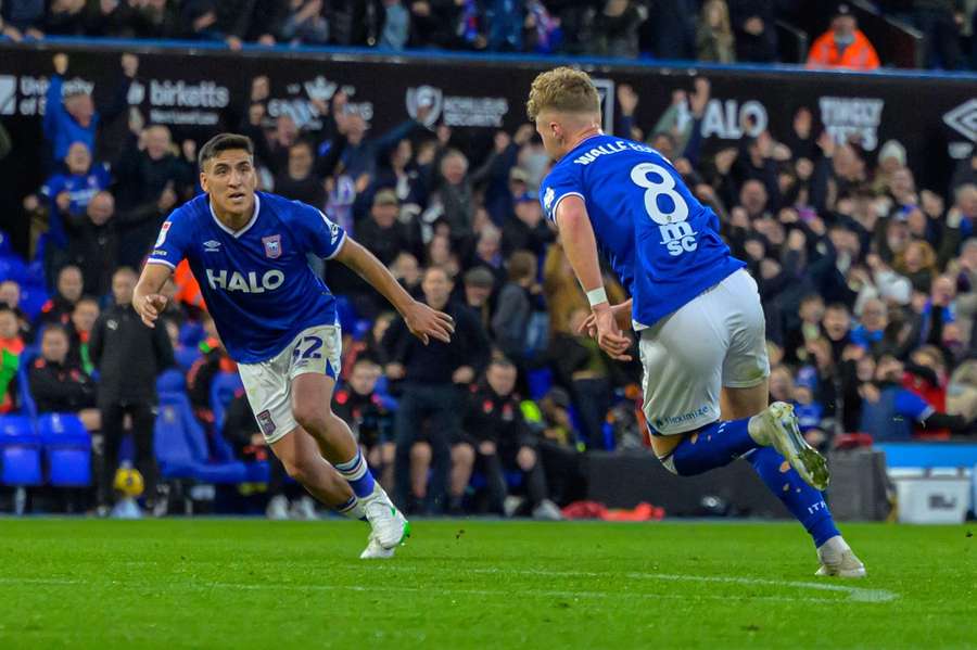 Ipswich's players celebrate against Coventry