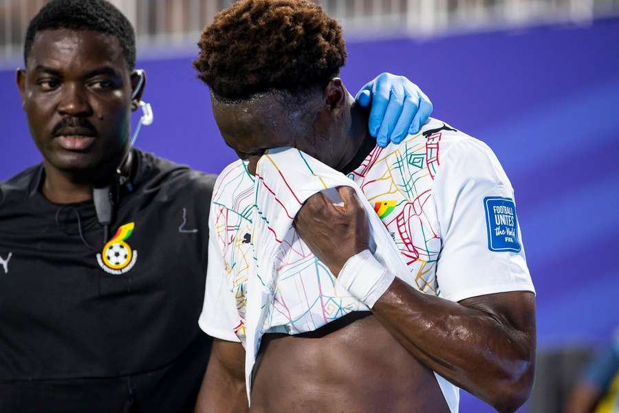 Marvin Senaya in tears after hamstring injury against Colombia