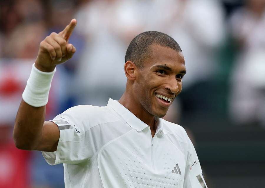 Auger-Aliassime celebrates his win