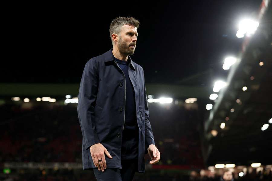 Man Utd manager Michael Carrick leaves the pitch after their draw at home to Tottenham Man Utd manager Michael Carrick leaves the pitch after their draw at home to Tottenham