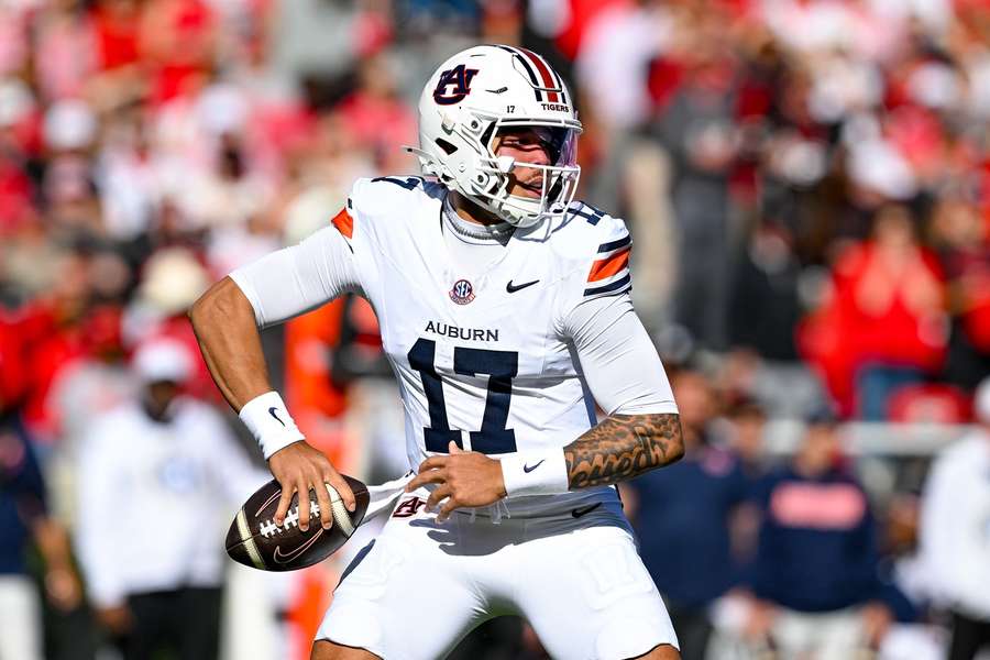 Auburn quarterback Byrum Brown is looking to make a pass against the Georgia Bulldogs 