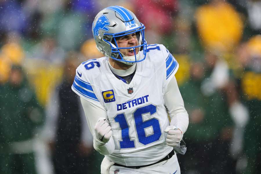 Detroit Lions quarterback Jared Goff reacts after throwing a second-quarter touchdown pass against the Green Bay Packers