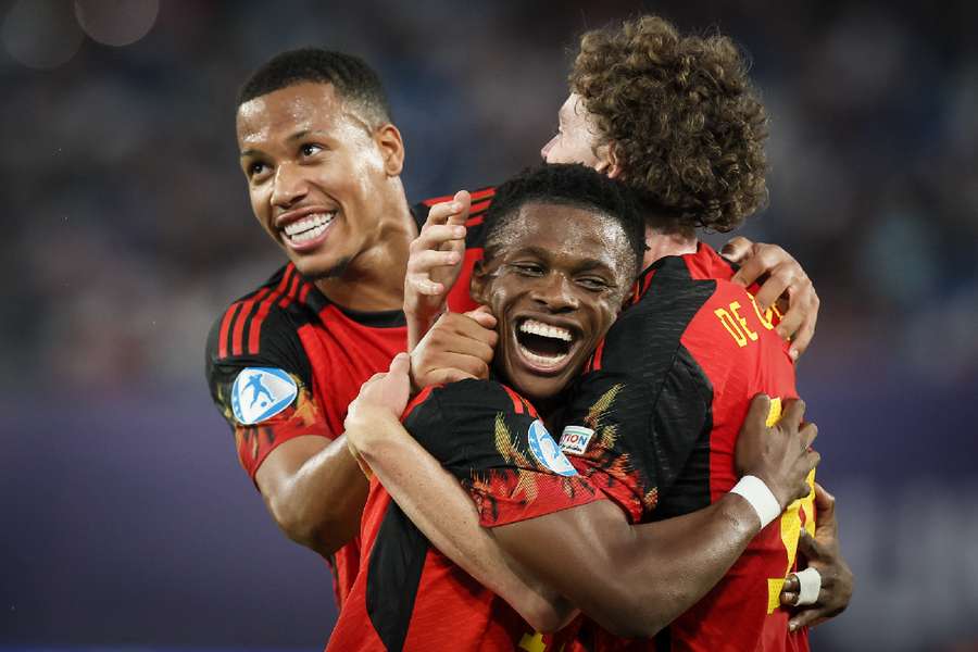 Belgian players celebrate scoring their second goal against Georgia