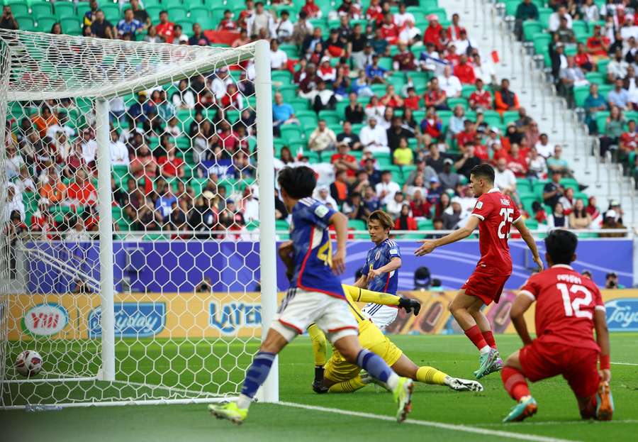Japan's Ayase Ueda scores their second goal
