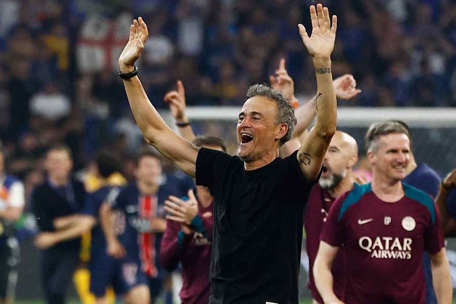 Luis Enrique celebrates winning the Champions League ahead of the Club World Cup