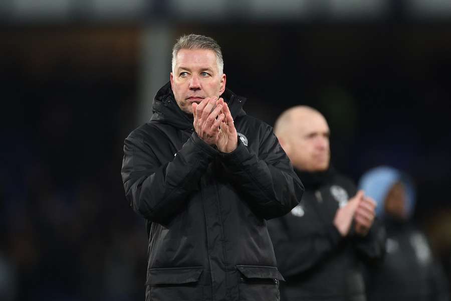 Ferguson applauds the Peterborough supporters