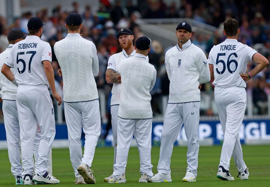 England's captain Ben Stokes (C) and England's James Anderson (2R) react after a review overturns a decision to give Australia's Marnus Labuschagne out England's captain Ben Stokes (C) and England's James Anderson (2R) react after a review overturns a decision to give Australia's Marnus Labuschagne out