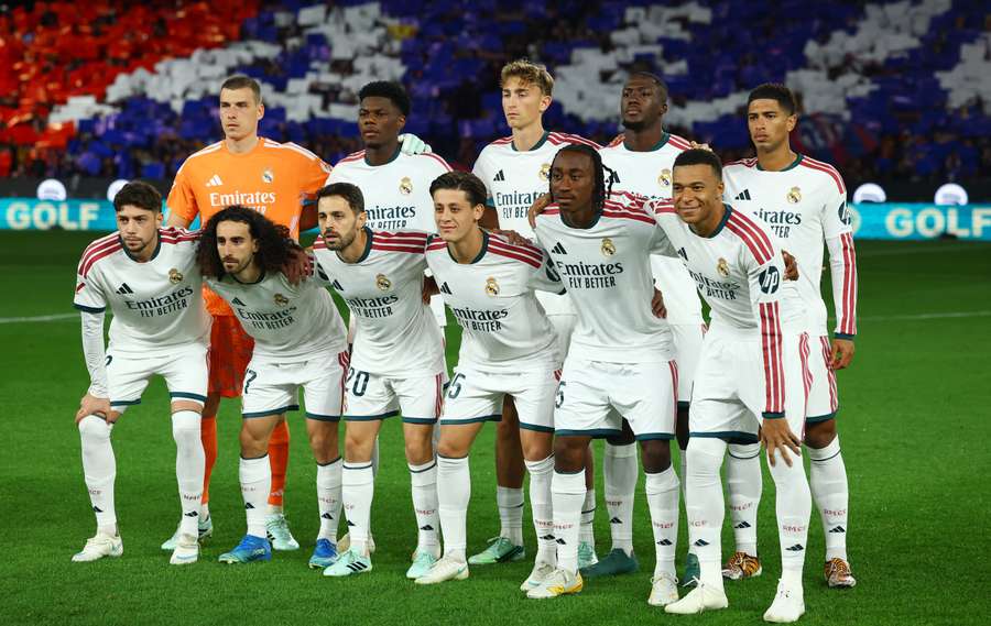 Real Madrid players pose for a team group photo before the match