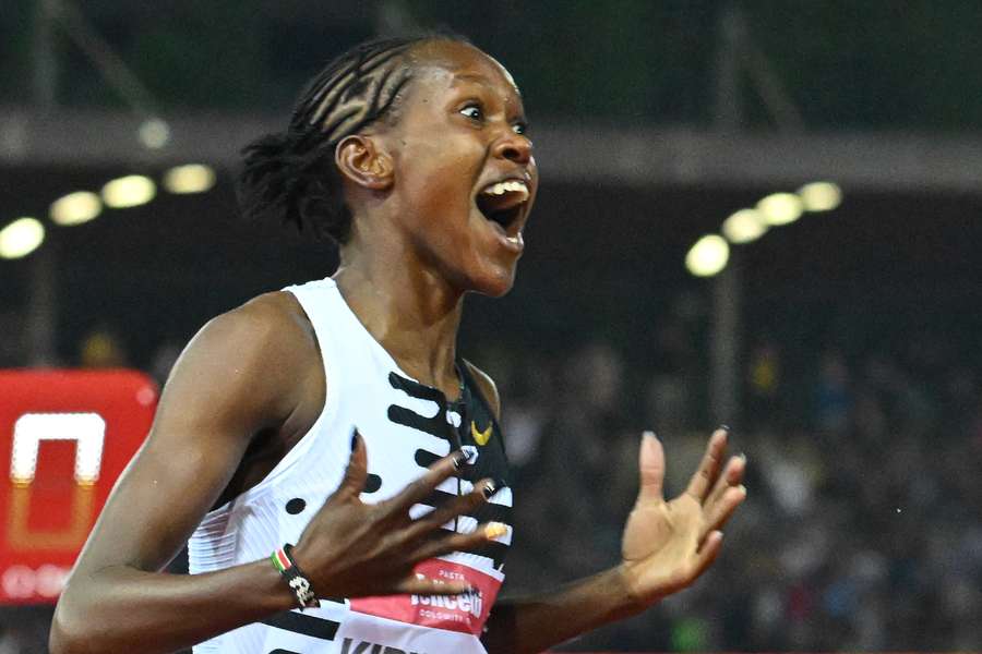 Faith Kipyegon reacts as after winning the 1500m in a world record time