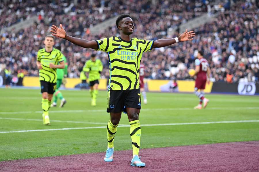 Bukayo Saka celebrates one of his two goals against West Ham