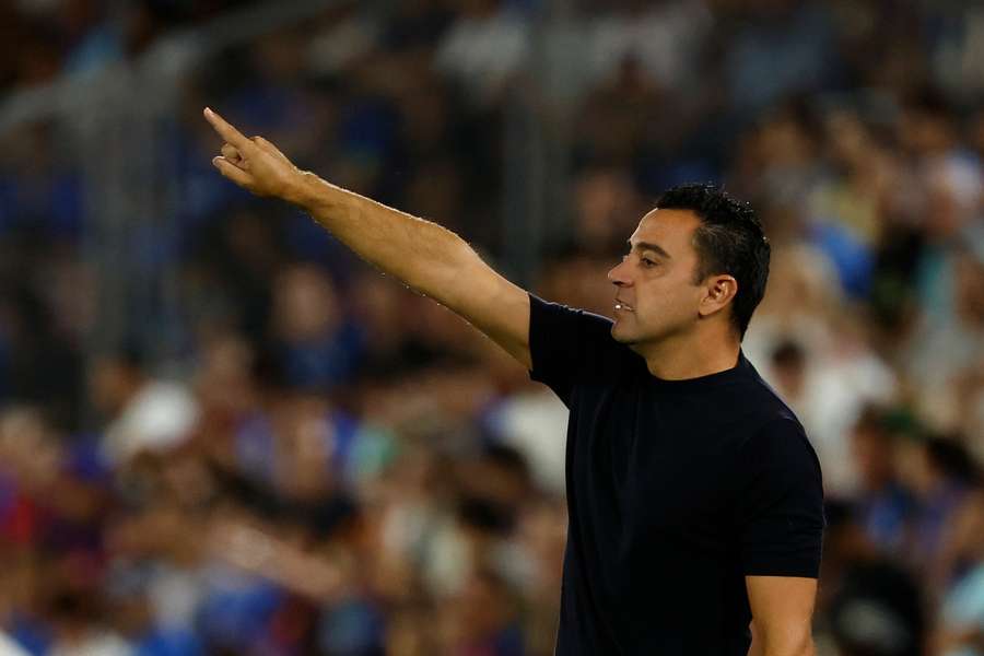 Xavi em ação contra o Getafe