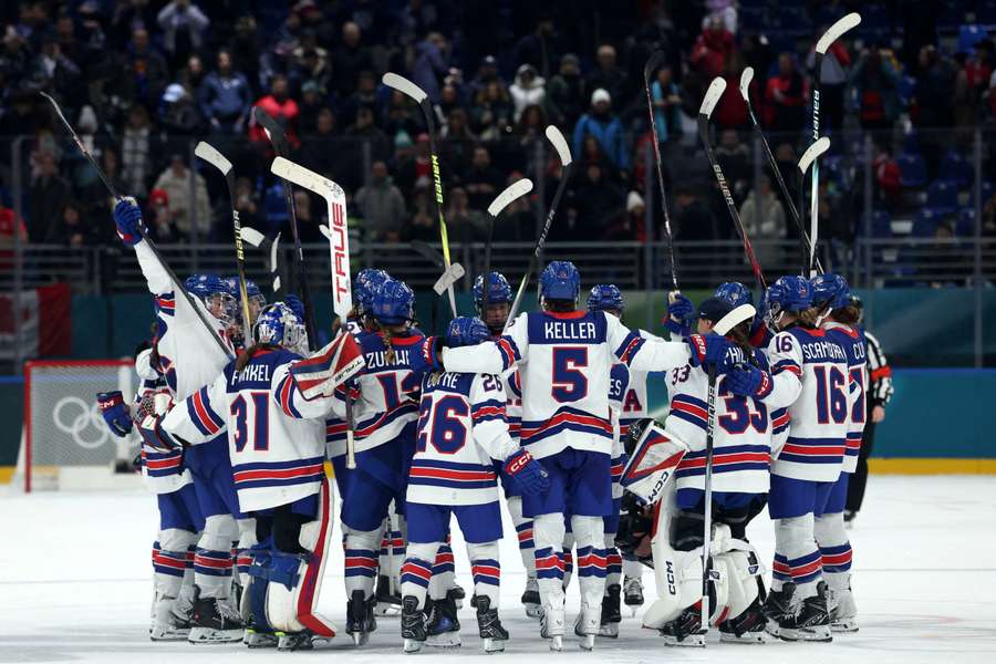 The United States players celebrate after their win over Canada 