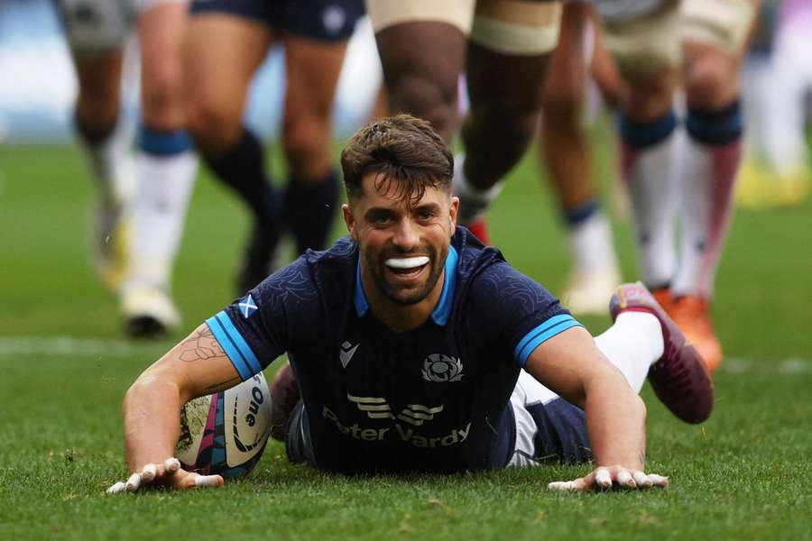 Hastings celebrates scoring a try against Fiji